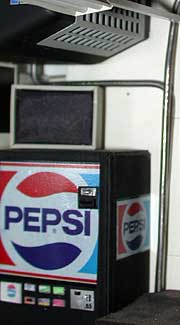 Scratchbuilt Pepsi soda machine, tv set, and custom heater blower